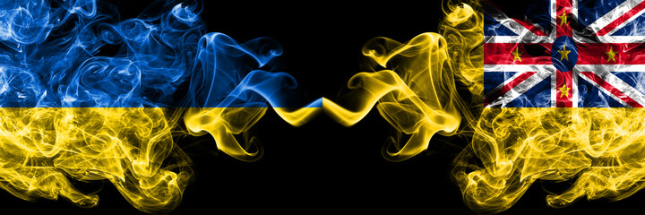 Ukraine, Ukrainian vs New Zealand, Niue smoky mystic flags placed side by side. Thick colored silky abstract smokes flags.