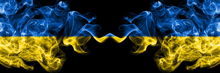 Ukraine, Ukrainian vs Ukraine, Ukrainian smoky mystic flags placed side by side. Thick colored silky abstract smokes flags.