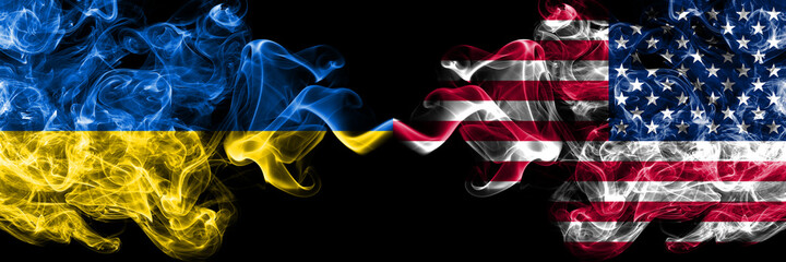 Ukraine, Ukrainian vs United States of America, America, US, USA, American smoky mystic flags placed side by side. Thick colored silky abstract smokes flags.