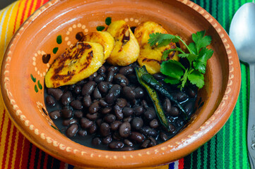 Traditional Mexican and Central American breakfast. Black beans and plantain