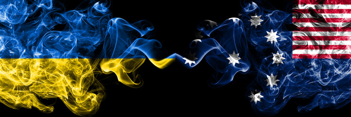 Ukraine, Ukrainian vs United States of America, America, US, USA, American, Easton, Pennsylvania smoky mystic flags placed side by side. Thick colored silky abstract smokes flags.