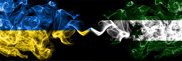 Ukraine, Ukrainian vs United States of America, America, US, USA, American, Greenbelt, Maryland smoky mystic flags placed side by side. Thick colored silky abstract smokes flags.