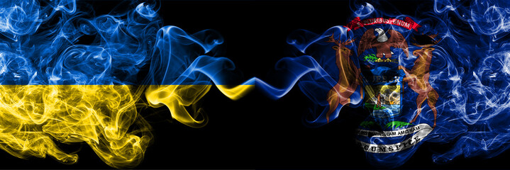 Ukraine, Ukrainian vs United States of America, America, US, USA, American, Michigan smoky mystic flags placed side by side. Thick colored silky abstract smokes flags.