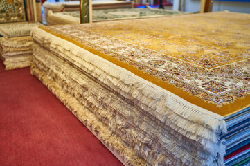 colorful carpets lie on the market