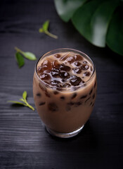 Taiwan milk tea with bubble (tapioca ball)on wood background