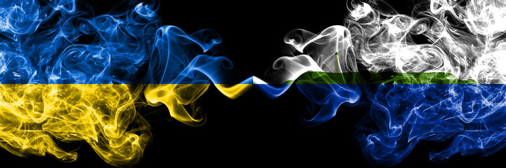 Ukraine, Ukrainian vs United States of America, America, US, USA, American, Navassa Island smoky mystic flags placed side by side. Thick colored silky abstract smokes flags.