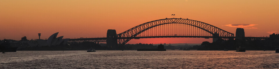Sydney harbor bridge just after sunset.