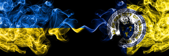Ukraine, Ukrainian vs United States of America, America, US, USA, American, Trenton, New Jersey smoky mystic flags placed side by side. Thick colored silky abstract smokes flags.