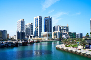 Obraz premium high-rise buildings stand on the horizon, modern Dubai