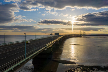 Fototapeta premium Severn Bridge crossing from England to Wales, at sunset. The bridge is also called the Prince of Wales Bridge