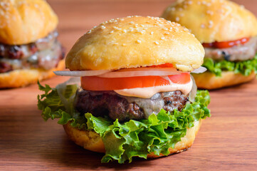 Home made barbecue cheese burgers in brioche bread buns