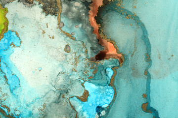 Art Abstract paintin blue and gold blots landscape background. Alcohol ink colors. Marble texture.