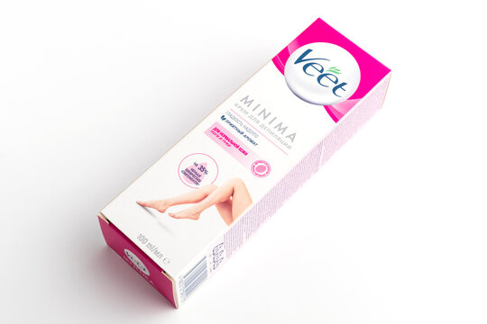 Pack of Veet cream for depilation of arms and legs, for normal skin. Light background