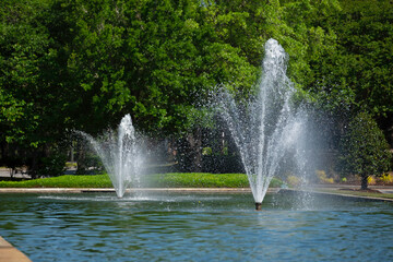 Fototapeta premium Two fountains in a park