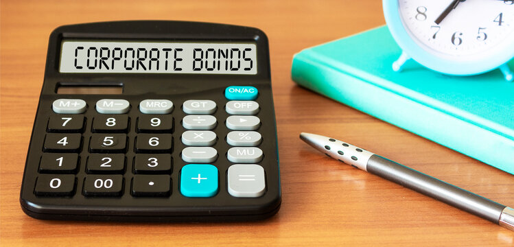 The text Corporate Bonds is written on the display of the calculator. Corporation of business photo texts to raise funds for various reasons