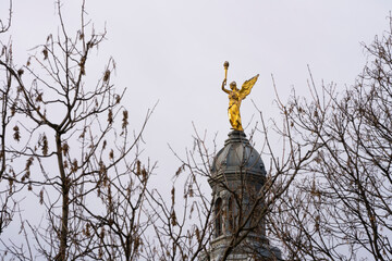 A golden angel with a torch