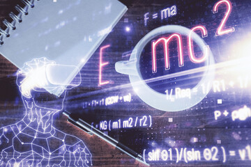 Double exposure of tech formula drawing and work table top veiw. concept of education.