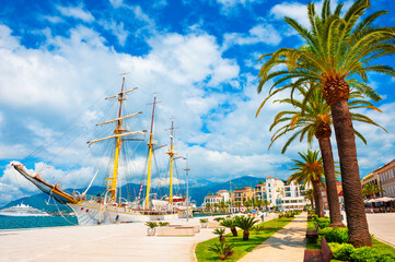 Beautiful promenade with palms in sea port of Tivat, Montenegro. Kotor bay, Adriatic sea. Famous...