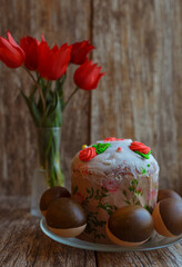easter cake with tulips and easter eggs