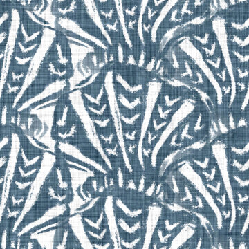 Blue scallop shell block print on a soft white linen texture background. Seamless bright summer cloth fabric for fresh coastal cottage beach decor. Modern stylised marine sea life hand drawn linocut
