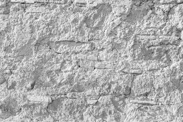Fototapeta na wymiar Old grungy retro faded bumpy simple brick wall of ancient city. Uneven pitted peeled soft surface brickwork of worn cellar. Ruined ragged shabby stiff block. Hard grunge brickwall of 3D minimal design
