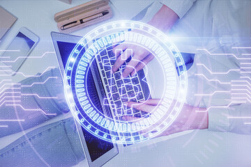 Double exposure of woman hands working on computer and blockchain theme hologram drawing. Top View. bitcoin cryptocurrency concept.