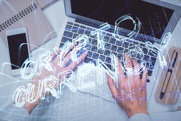 Double exposure of woman hands working on computer and blockchain theme hologram drawing. Top View. bitcoin cryptocurrency concept.