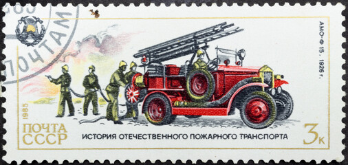Postage stamp 'Fire truck AMO-F 15, 1926' printed in USSR. Series: 'History of USSR fire transport' by artist A.Aksamit, 1985