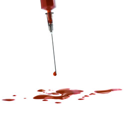 Syringe with red drop isolated on white background