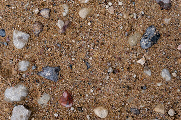gravel road close-up with different colored stones