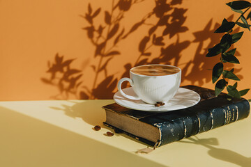 breakfast with a cup of black coffee on a colored background 