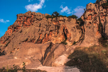 The wonderful geography of Phrygia. City of the Phrygians. Rocks, steppe and mountains. View of the Phrygian valley. Rock houses in the ancient city.