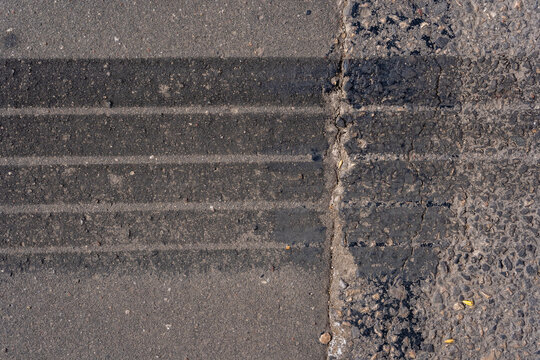 asphalt close-up with tire trace