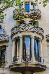 Obraz premium Building facade: Old style windows, balcony. Barcelona, Catalonia, Spain.