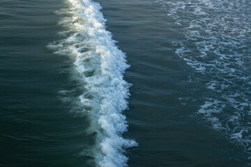 Ocean waves in the morning sun