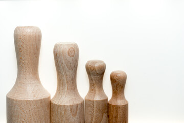 plain beech wood scoops on a white background with slight shadow