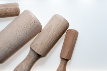plain beech wood scoops on a white background with slight shadow