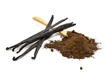 Dried Vanilla sticks and powder with spoon isolated on white background