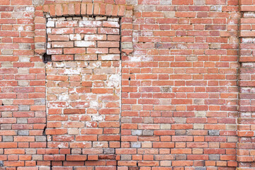 wall of old brick with laid windows, vintage background