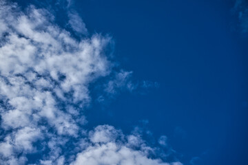 Blue sky and white cotton clouds background. Alicante, Spain.