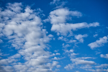 Blue sky and white cotton clouds background. Alicante, Spain.