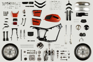 Top view of the details of a restored retro motorcycle laid out on a light surface
