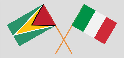 Crossed flags of Guyana and Italy. Official colors. Correct proportion