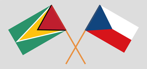 Crossed flags of Guyana and Czech Republic. Official colors. Correct proportion