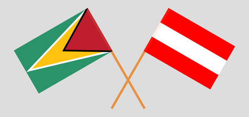 Crossed flags of Guyana and Austria. Official colors. Correct proportion