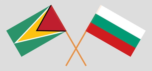 Crossed flags of Guyana and Bulgaria. Official colors. Correct proportion