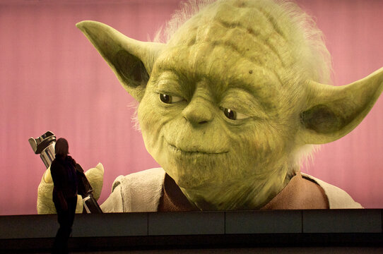 Yoda from Star Wars Welcomes airline passengers to the 2012 London Olympic Games, Heathrow Airport, Longford, United Kingdom