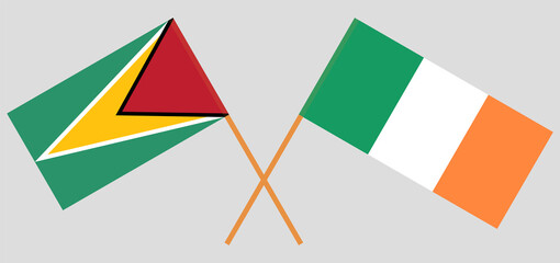 Obraz premium Crossed flags of Guyana and Ireland. Official colors. Correct proportion