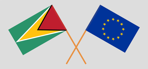 Crossed flags of Guyana and European Union. Official colors. Correct proportion