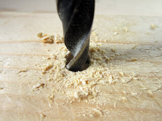   drilling wood with a drill   